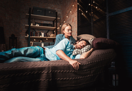 Couple moments in the bedroom. Domestic life homeの写真素材