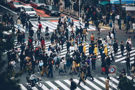TOKYO, JAPAN -OCTOBER 20, 2017: Busy streets of Shibuya district in Tokyo at night, Japan. Shibuya is one of the shopping and financial districtsのeditorial素材