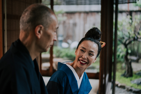 Senior couple lifestyle moments in a traditional japanese houseの写真素材