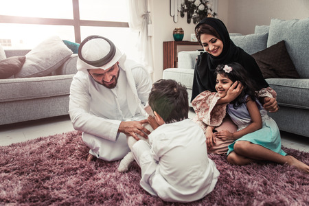 Arabic happy family lifestyle moments at homeの写真素材