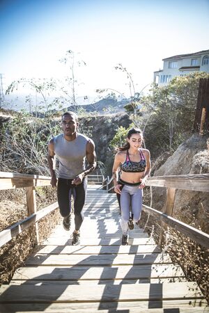 Couple training outdoors