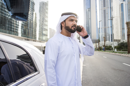 Ararabic businessman wearing kandora - Portrait of traditional emirati manの写真素材