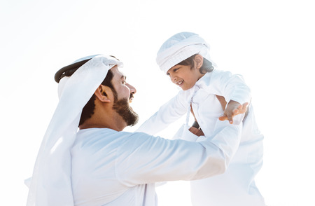 Father and son spending time in the desertの写真素材