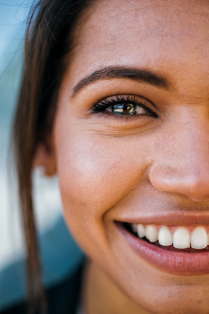 Beautiful woman and her blue eyes, macro shotの写真素材