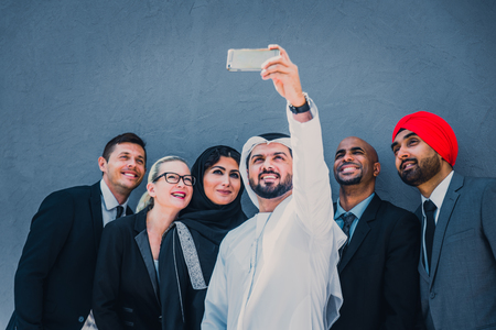 Multicultural business people meeting and talking about business - Multiracial business team meeting