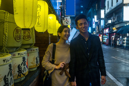 Beautiful happy couple dating in Tokyoのeditorial素材