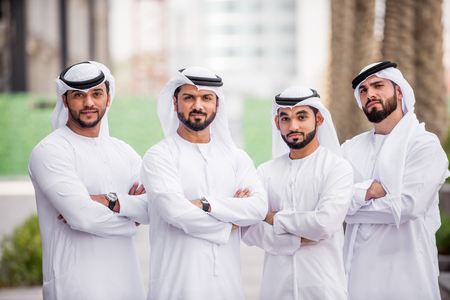 Arabian men meeting and talking about business - Businessmen portrait in Dubaiの写真素材