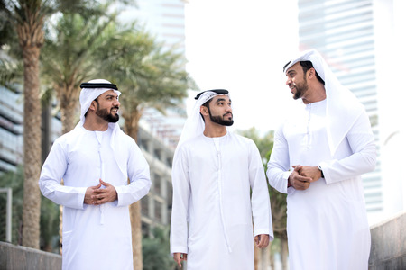 Arabian men meeting and talking about business - Businessmen portrait in Dubai