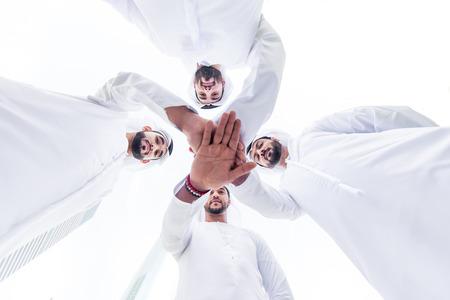 Arabian men meeting and talking about business - Businessmen portrait in Dubaiの写真素材