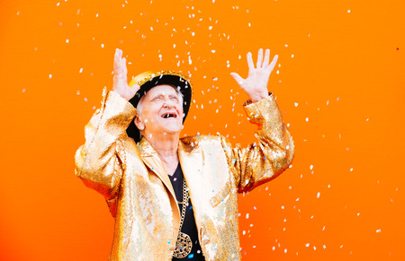 Grandmother portraits on colored backgroundsの写真素材