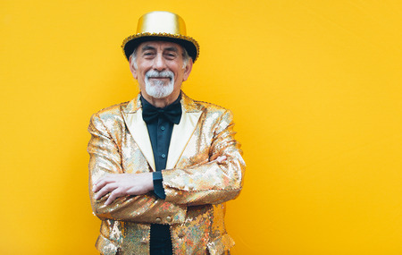 Grandfather portraits on colored backgroundsの写真素材