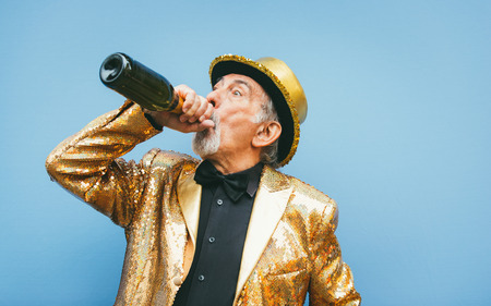 Grandfather portraits on colored backgroundsの写真素材