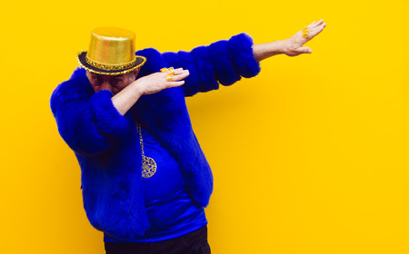 Grandfather portraits on colored backgroundsの写真素材