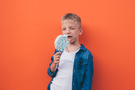 Happy kid lifestyle moments on colore backgroundsの写真素材