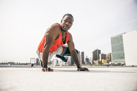 Sportive man training outdoors - Runner jogging, healthy lifestyle and sport concept