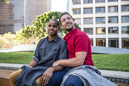 Homosexual couple at a romantic date outdoors - Gay couple in love flirting and having fun