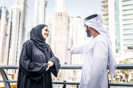 Arabic couple with traditional clothes dating outdoorsの写真素材