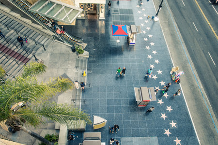 HOLLYWOOD, CA - OCTOBER 12, 2016: People visit Walk of Fame in Hollywood. Hollywood Walk of Fame features more than 2,500 stars with inscribed celebrity names.のeditorial素材