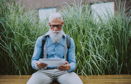 Senior hipster with stylish beard portraits