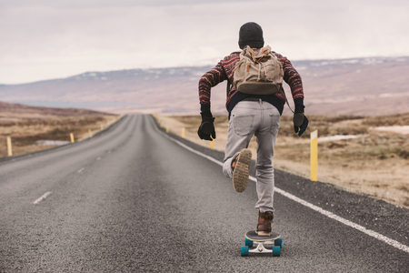 Skater traveling iceland on his longboardの写真素材