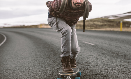 Skater traveling iceland on his longboardの写真素材