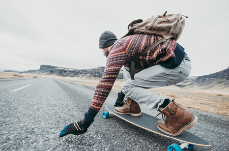 Skater traveling iceland on his longboardの写真素材