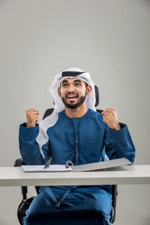 Portrait of arabic man with kandora in a studioの写真素材