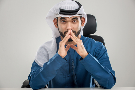 Portrait of arabic man with kandora in a studioの写真素材