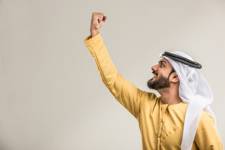 Portrait of arabic man with kandora in a studioの写真素材