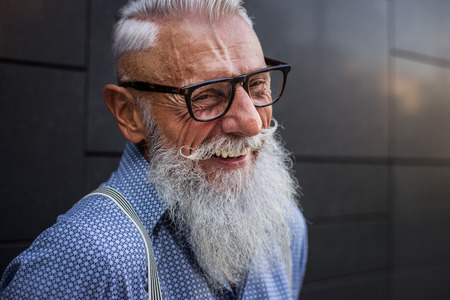Handsome senior man portrait - Youthful and stylish man in the sixties, concepts about lifestyle, seniors and businessの写真素材