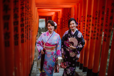 Two japanese girls wearing kimonos traditional clothes, lifestyle momentsのeditorial素材