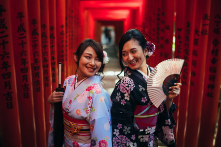 Two japanese girls wearing kimonos traditional clothes, lifestyle momentsのeditorial素材
