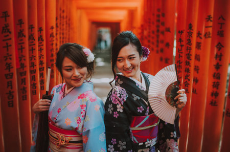 Two japanese girls wearing kimonos traditional clothes, lifestyle momentsのeditorial素材