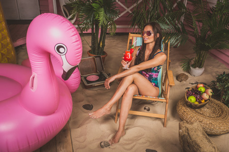 Beautiful girl enjoying time at the private beachの写真素材