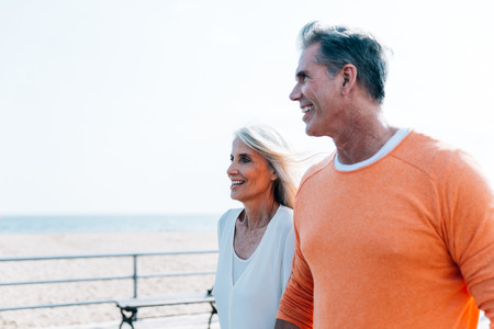 Happy senior couple spending time at the beach. Concepts about love,seniority and peopleの写真素材