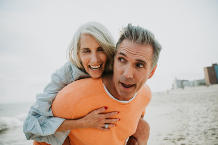 Happy senior couple spending time at the beach. Concepts about love,seniority and peopleの写真素材