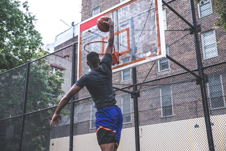 Basketball player training on a court in New york city