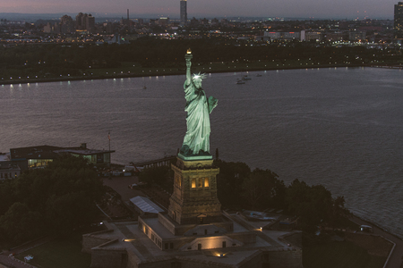 Statue of Liberty from above, New York - View of NY landmarks from helicopter tourの写真素材