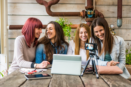 Fashion and cosmetic bloggers talking recording a vlog streamingの写真素材