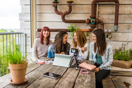 Fashion and cosmetic bloggers talking recording a vlog streamingの写真素材