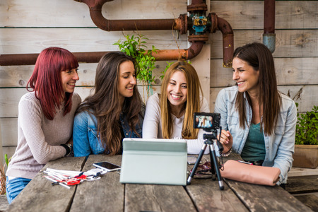 Fashion and cosmetic bloggers talking recording a vlog streamingの写真素材