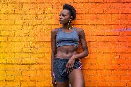 Young fitness woman running in New York - Sportive girl training outdoors, concepts about sport and healthy lifestyleの写真素材