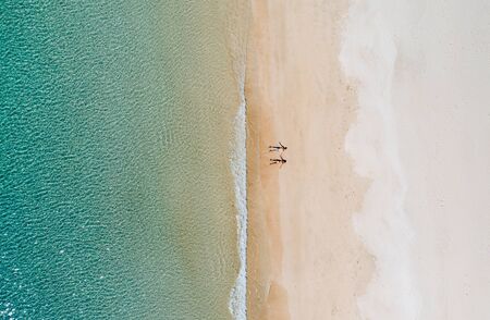 Couple enjoying time  in front of the beach in Coron. Concept about summer, lifestyle,wanderlust travel and natureの写真素材