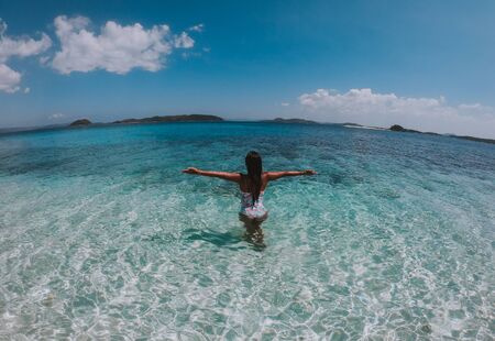 Beautiful woman enjoying the view on a tropical island in the philippines. concept about wanderlust travelsの写真素材