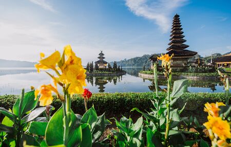 visiting the ulun danu bratan temple in Bali. Concept about exotic lifestyle wanderlust travelingの写真素材