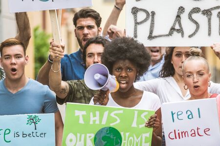 Group of activists is protesting outdoorsの写真素材