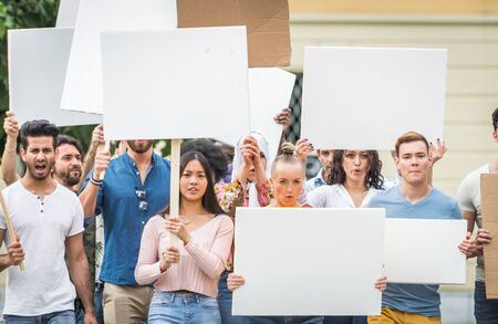 Group of activists is protesting outdoorsの写真素材