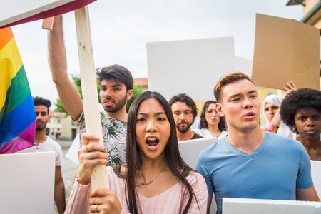 Group of activists is protesting outdoorsの写真素材