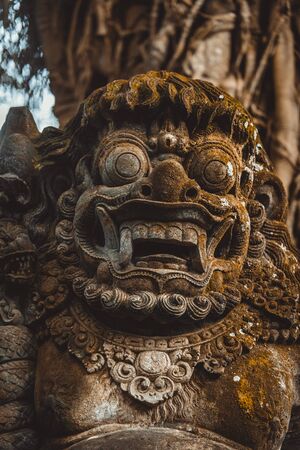 Statue in the sacred Monkey Forest, Ubud, Bali, Indonesiaの写真素材