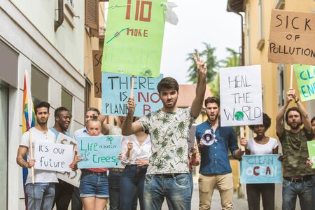 Group of activists is protesting outdoorsの写真素材